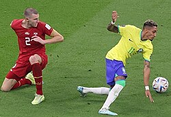 Raphinha (right) with Brazil playing against Serbia at the 2022 FIFA World Cup