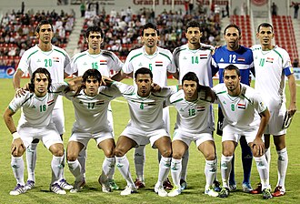 The Iraqi national team pose ahead of their 2014 FIFA World Cup qualification match against China in Doha.