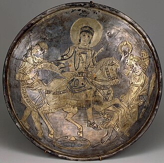 Missorium of Kerch depicting Constantius II on horseback with a spear. He is preceded by victory and accompanied by a guardsman (Hermitage Museum).