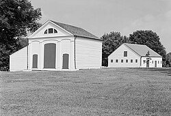 Carriage house (left) and stable (right) at Melrose in Natchez, Mississippi