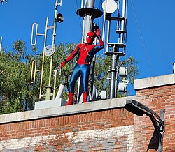 Spider-Man on top of the Web Slingers: A Spider-Man Adventure building
