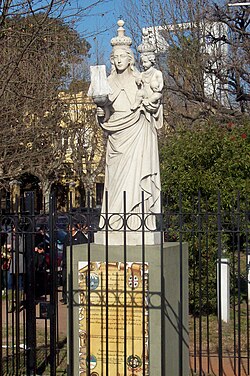 Our Lady of the Buen Aire in front of the National Migration Department
