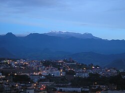 The Nevado del Ruiz of Los Nevados National Park seen from the city