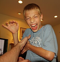 Laughter is a common response to tickling.