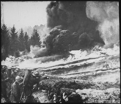 French soldiers making a gas and flame attack on German trenches in Flanders