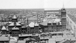 The second Orleans Parish Prison at left, next to the contemporary Criminal Courts Building, around 1900