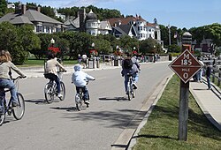 Cyclists enjoy the carfree highway (M-185) on Mackinac Island.