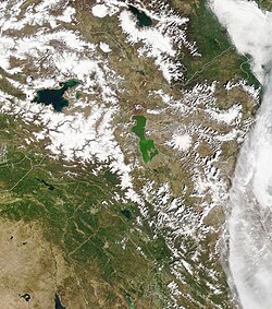 Lake Urmia (centre) and surrounds rain-shadowed by the snowy Zagros Mountains to the west.