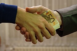 Giving money illegally or unethically to influence a person's behavior is a form of bribery.