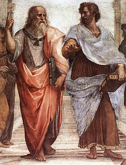 Plato (left) and Aristotle in Raphael's 1509 fresco, The School of Athens. Aristotle holds his Nicomachean Ethics and gestures to the earth, representing his view in immanent realism, whilst Plato gestures to the heavens, indicating his Theory of Forms, and holds his Timaeus.[47][48]