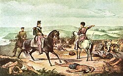 Coloured engraving depicting 3 uniformed men on horseback on a hilltop with dead bodies strewn about and one uniformed man pointing to the valley below in which half-naked warriors are fleeing before a line of uniformed and mounted troops
