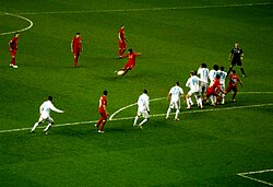 Suárez about to score a 35-yard free kick against Zenit Saint Petersburg, his second goal in a 3–1 win, March 2013
