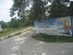 García Márquez billboard in Aracataca: "I feel Latin American from whatever country, but I have never renounced the nostalgia of my homeland: Aracataca, to which I returned one day and discovered that between reality and nostalgia was the raw material for my work". —Gabriel García Márquez