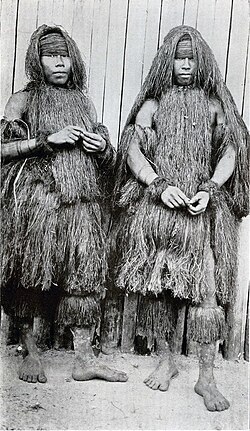 “Yahua men in grass clothing, Pebas, Peru.”