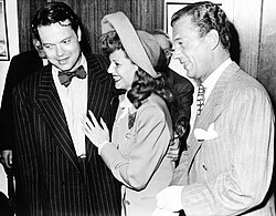 Rita Hayworth took a lunch-hour break from the set of Cover Girl to marry Welles, with best man Cotten (September 7, 1943).[106]: 91