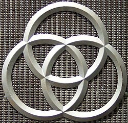 The three rings were the symbol for Krupp, based on the Radreifen – the seamless railroad wheel tires patented by Alfred Krupp. The rings are currently part of the ThyssenKrupp logotype.
