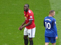 Rooney (pictured with Manchester United striker Romelu Lukaku in September 2017) retained the number 10 jersey at club level when he moved to Everton in July 2017.