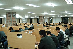 The reading room of a universities' library with private cells