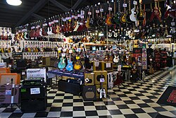 A selection of guitars and amps at Apple Music Row