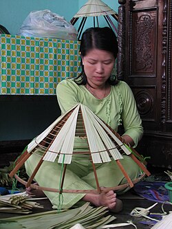 Making conical hats (nón lá) in Huế countryside, Vietnam