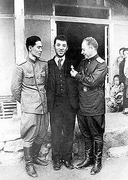 Kim Il Sung (center) receiving a medal from Soviet officers in Pyongyang, October 1945