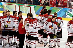 Sidney Crosby celebrates moments after scoring the gold medal-winning goal over the United States.