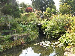 Pool in the rock garden at RHS Wisley, wholly artificial and constructed in the 1920s.