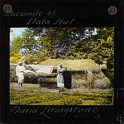 Replica of kitanda and Livingstone's Hut, lantern slide.
