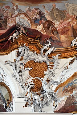 Detail of the ceiling at Zwiefalten Abbey, Germany (1739–1745), showing the Rococo synthesis of illusionistic fresco, gilded architecture, and moulded stucco