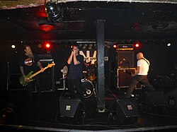 Negative Approach in T-shirts at a 2013 show