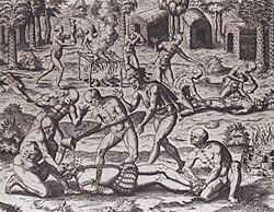 A 16th-century illustration by Flemish Protestant Theodor de Bry for Las Casas' A Short Account of the Destruction of the Indies depicting Taínos fighting back against Spaniards, showing cannibalism and forcing a Spaniard to swallow molten gold