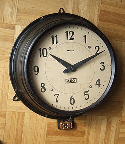 Industrial clock designed by Behrens for AEG in 1909
