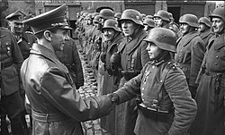 Goebbels awarding 16-year-old Hitler Youth Willi Hübner the Iron Cross for the defence of Lauban (now Lubań in Poland)