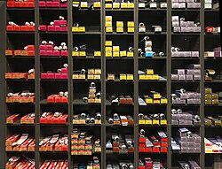 Shelf with various hair dyes in a hairdresser shop