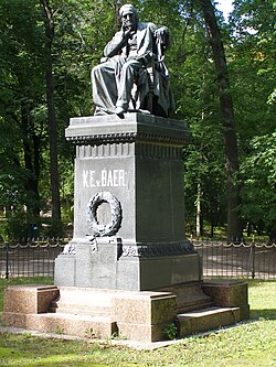 Statue of Karl Ernst von Baer on Toome Hill, Tartu: As a tradition, students wash the statue's head with champagne every Walpurgis Night.[35]