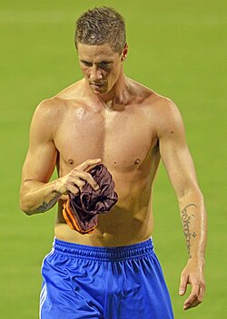 Torres's Tolkien tattoo can be seen on his left forearm