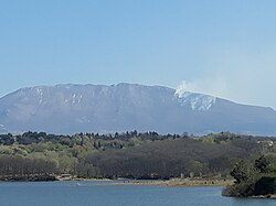 Forest fires visible from a distance in Dajti National Park, Tirana, Albania