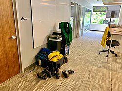 Go-bins in The Oregonian newsroom are filled with boots, hardhats, gear, and jackets for reporters covering wildfires at a moment's notice.