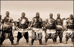 Strong Mongol men at August games. Photo by Wm. Purdom, 1909