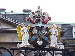 Guy's coat of arms, displayed above the entrance to Guy's Campus