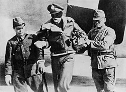 A blindfolded Doolittle Raider taken captive in 1942