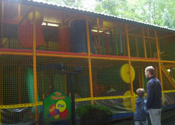 Multi-tiered climbing structures such as this one are common at family entertainment centers.