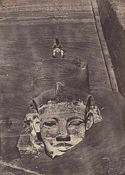 Maxime Du Camp, Ibsamboul (Abu Simbel), medial colossus of the speos of Phré, salted paper print from a negative calotype by Blanquart-Evrard process (1850)