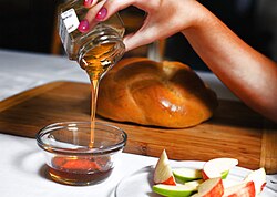 In Judaism, honey symbolizes the sweetness of the New Year, Rosh Hashanah, and is traditionally eaten with apple slices.