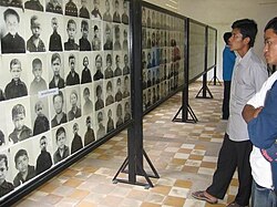 Rooms of the Tuol Sleng Genocide Museum contain thousands of photos taken by the Khmer Rouge of their victims.