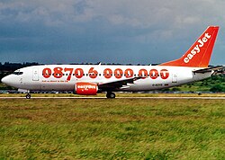 EasyJet Boeing 737-33V in the telephone number livery