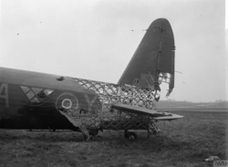The geodetic airframe of a Vickers Wellington, visible as a result of damage sustained to the fuselage skin on the aircraft's tail