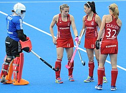 Great Britain's women's hockey players with their goal-keeper during a 2016 Champions Trophy match