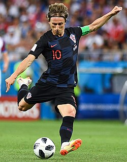 Luka Modrić is known for his ability to blend advanced playmaking with box-to-box play and deep-lying positioning.