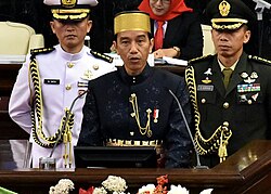 The presidential aide-de-camps behind Indonesian President Joko Widodo during his presidential speech to the Indonesian Parliament, known as the People's Consultative Assembly, in August 2017